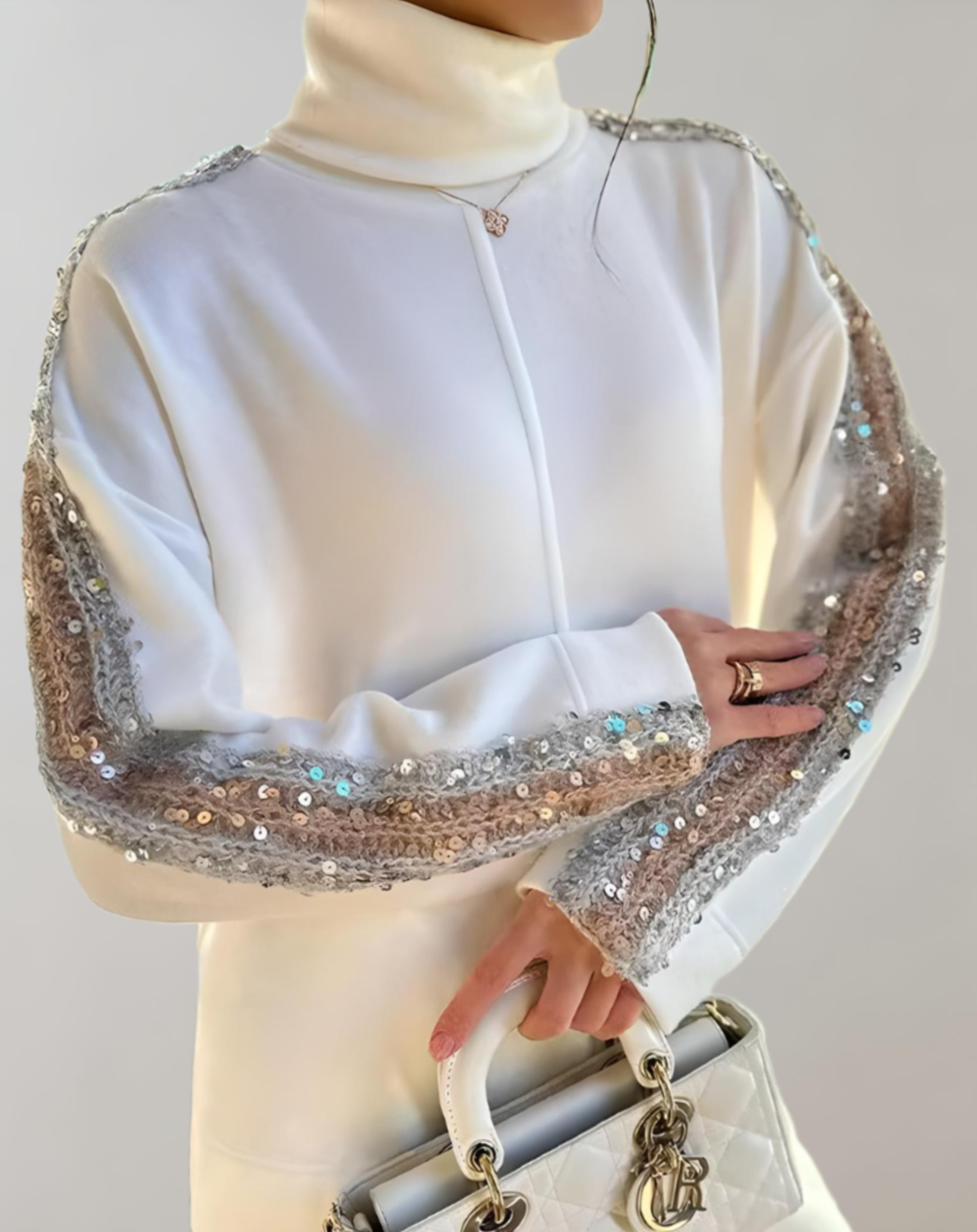 Alzina - Elegante set bestaande uit een witte glittertrui en een wijde glitterbroek